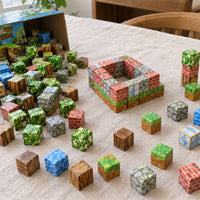 Forest Home magnetic cubes spread on the table, build in progress