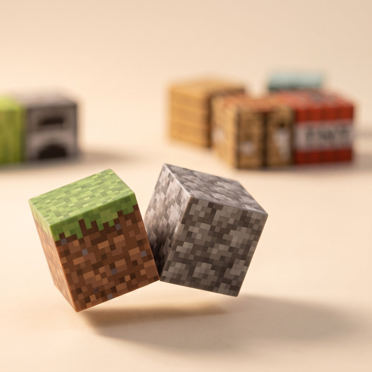 Two magnetic pixel cubes snapping together, close-up