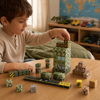 Child building the Military Base set with magnetic cubes