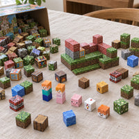 Red Brick House magnetic cubes spread on the table, build in progress