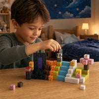 Child building the Volcano Portal set with magnetic cubes