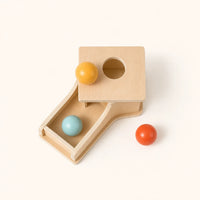 Object Permanence Box with Ball Return shown complete on a plain background