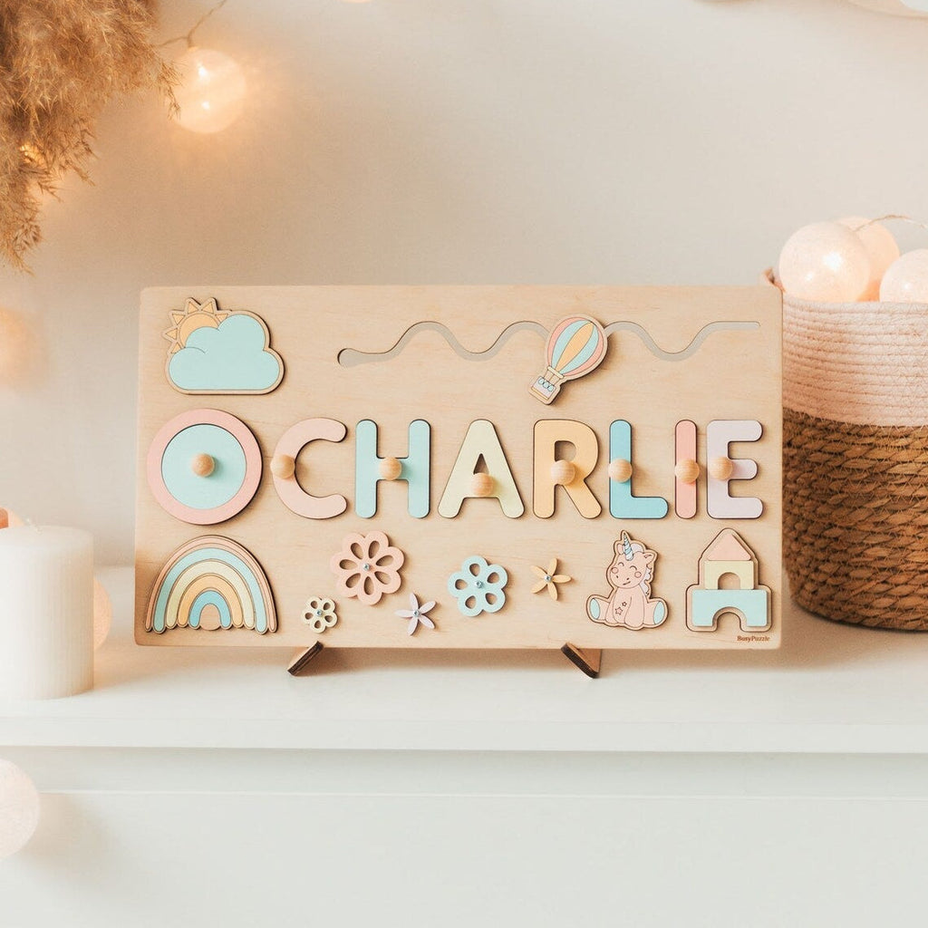 Wooden name puzzle spelling Charlie with rainbow and animal pieces