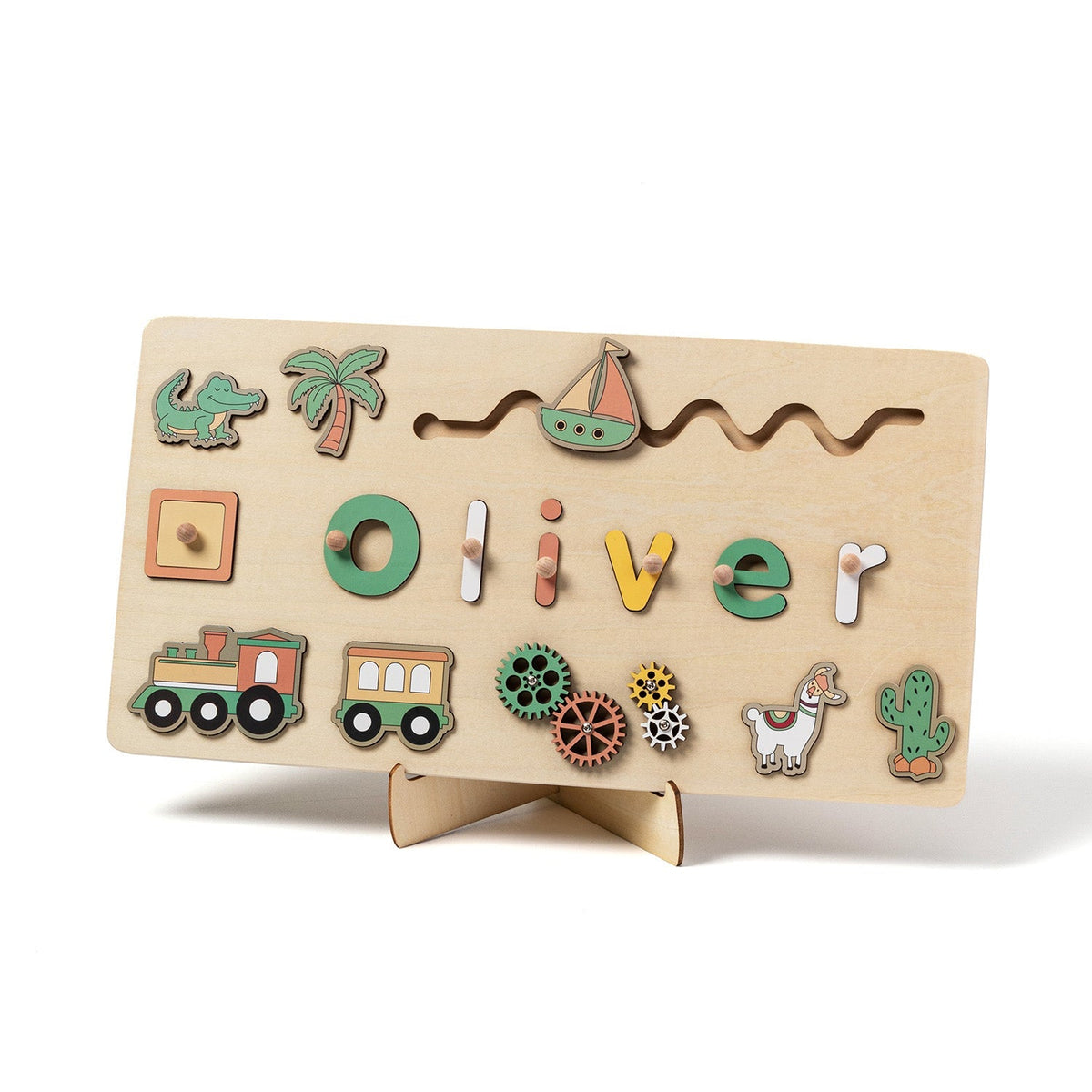 Name puzzle spelling Oliver with train, cactus and llama pieces