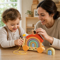 Child playing with the Pull Along Snail Toy Rainbow Stacking Shell