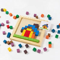 Pixel block tray with a completed pattern and scattered cubes