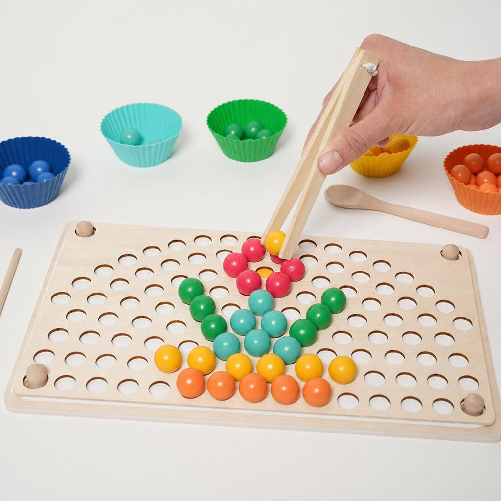 Child placing coloured beads on the pegboard with wooden tweezers