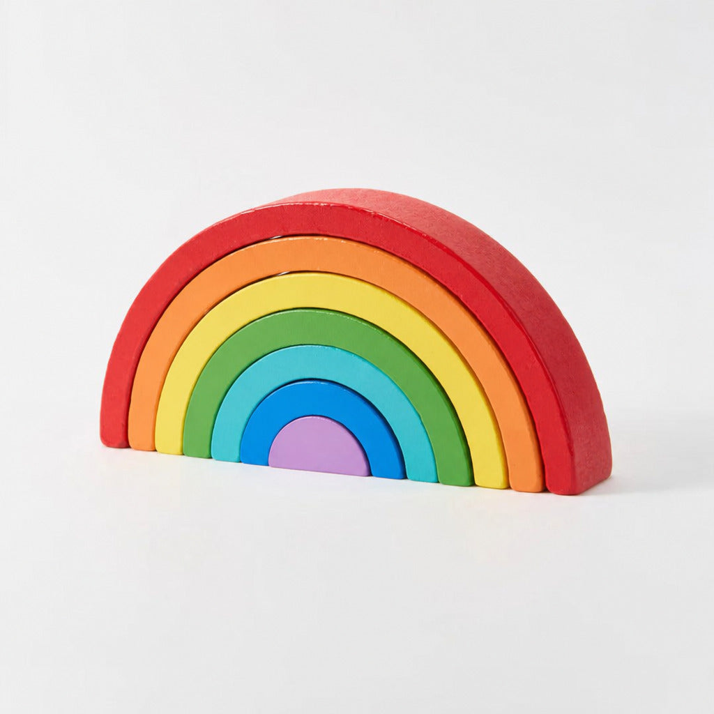 Wooden rainbow stacker assembled in bright rainbow colours