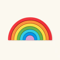 Rainbow Stacker Wooden Arches for Toddlers shown complete on a plain background