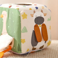 Sensory cube cow panel with textured fabric detail