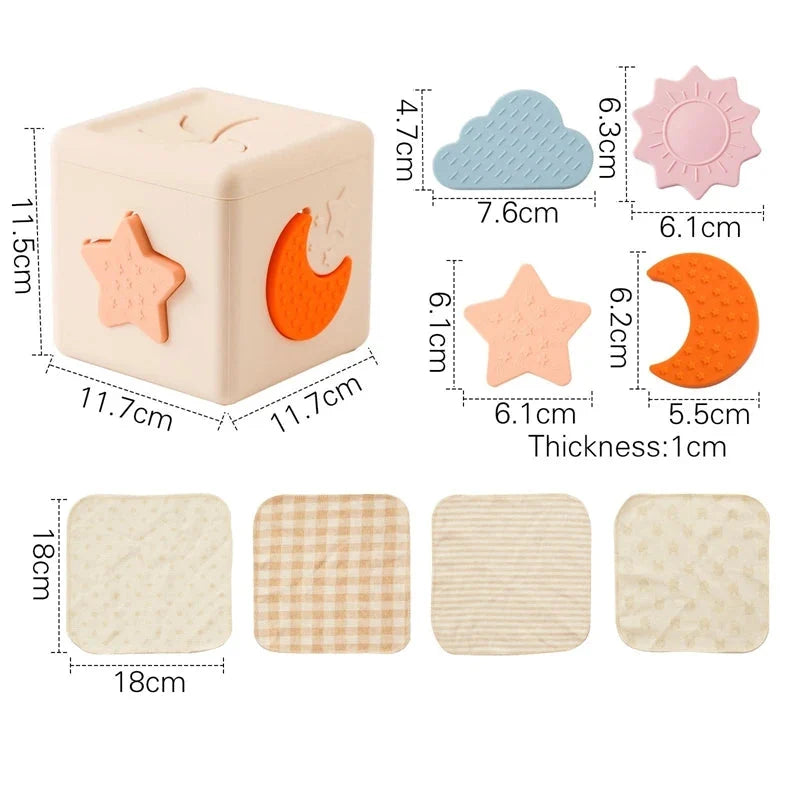 Silicone shape sorter cube with cloud, star and moon pieces and sizes