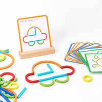 Card stand with sticks and rings arranged into a cloud shape