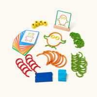Shape Building Puzzle with Sticks & Rings shown complete on a plain background
