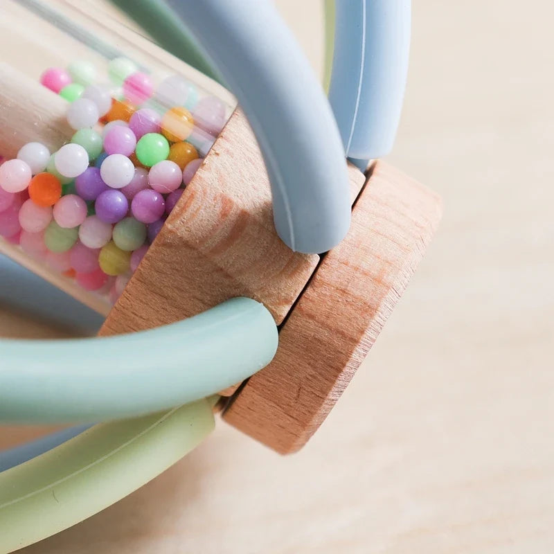 Close-up of the rattle's bead chamber and wooden ring joint