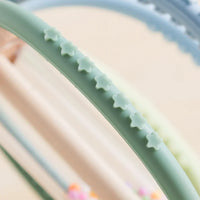 Close-up of the rattle's textured silicone ribs