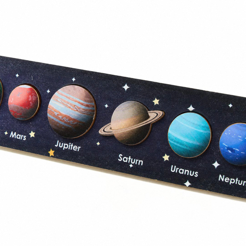 Solar system puzzle strip showing Mars, Jupiter, Saturn and Neptune