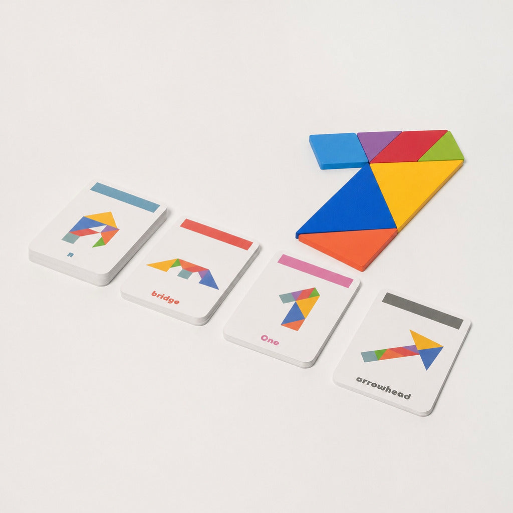 Tangram puzzle pieces with a set of printed pattern cards