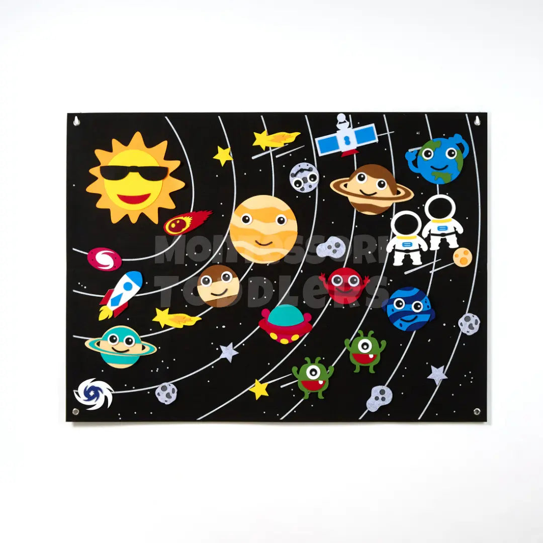 Space-themed felt board with planets, rockets and astronauts