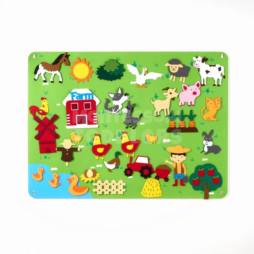 Farm-themed felt board with barn, tractor and farm animals