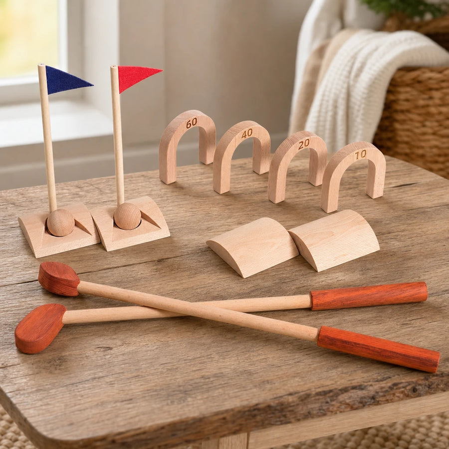 Toddler Golf Set - Wooden Outdoor Game for Kids set out on a real table at home
