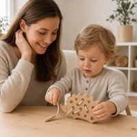 Child playing with the Toddler Lacing Toy Hedgehog Wooden