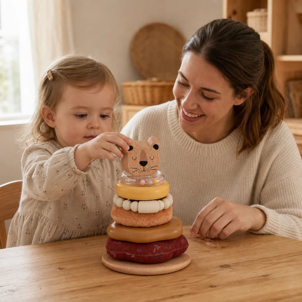 Child playing with the Toddler Stacking Rings Wooden Sensory Set