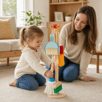 Child playing with the Toy Cleaning Set - Wooden Housekeeping Play Kit