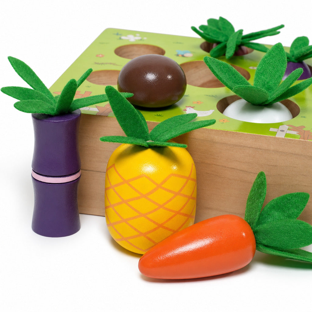 Wooden vegetable shape sorter box with the vegetables in place