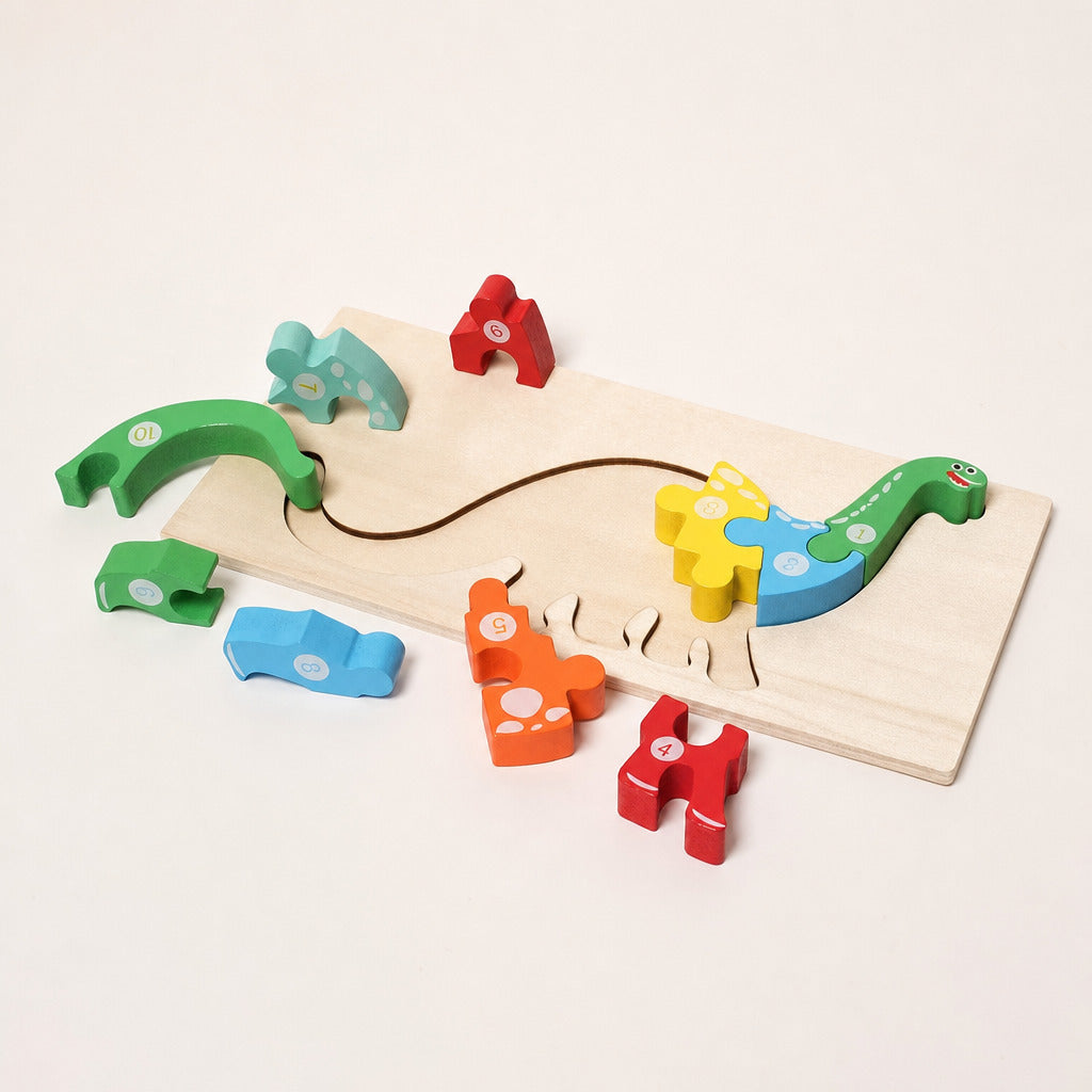 Numbered wooden animal puzzle board with dinosaur and crocodile pieces