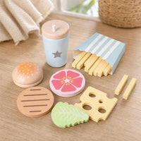 Wooden Burger Play Set Montessori Kitchen set out on a real table at home