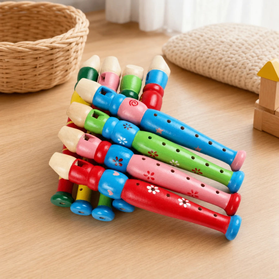 Wooden Flute Toy - Colorful Musical Instrument for Kids set out on a real table at home