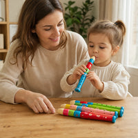 Child playing with the Wooden Flute Toy - Colorful Musical Instrument for Kids