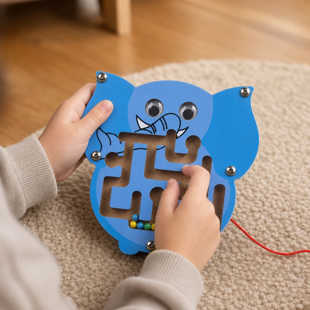 Close-up of a child's hands using the Wooden Maze Toy Elephant