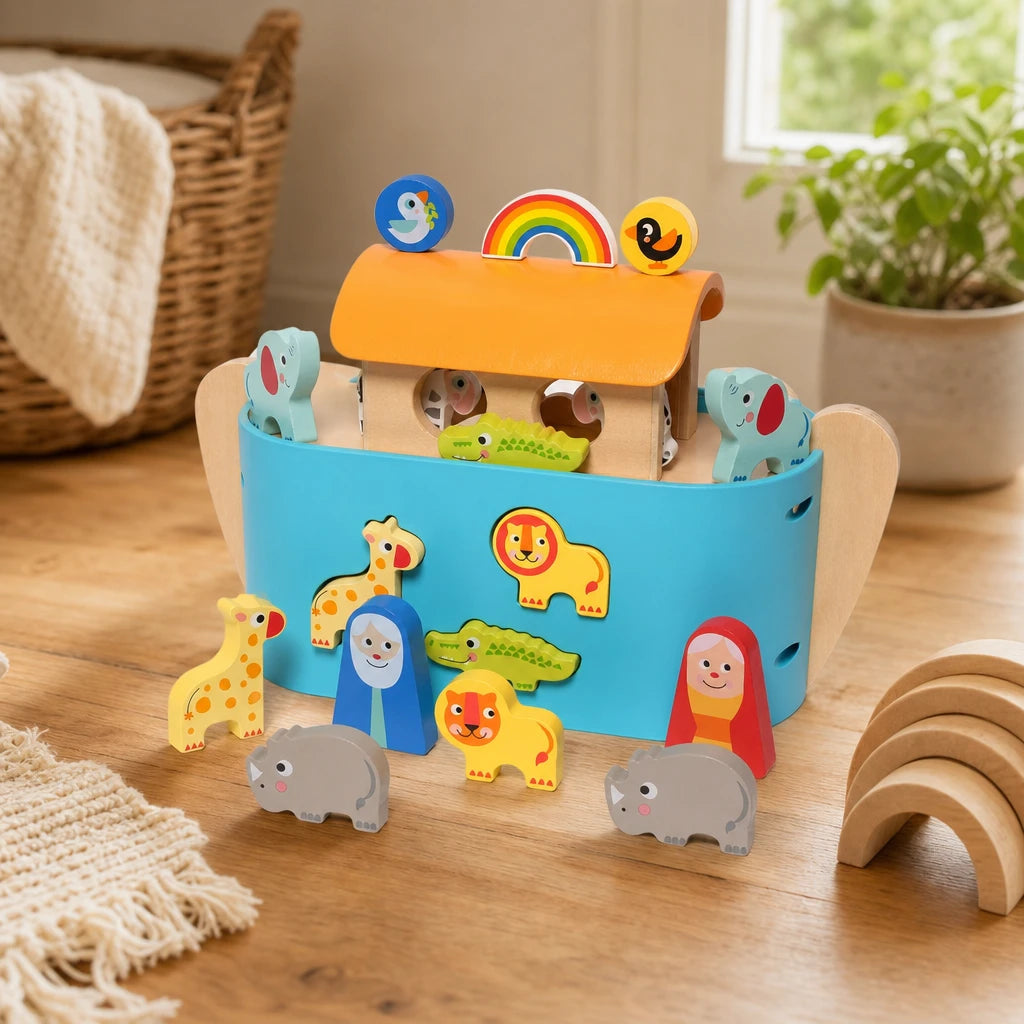Wooden Noah's Ark with Animals & Storybook shown on a real table surface