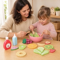 Child playing with the Wooden Play Food Set Fruit Salad Bowl