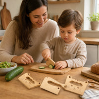 Child playing with the Wooden Play Knife Set Animal Shapes