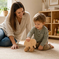 Child playing with the Wooden Push Toy Elephant on Wheels