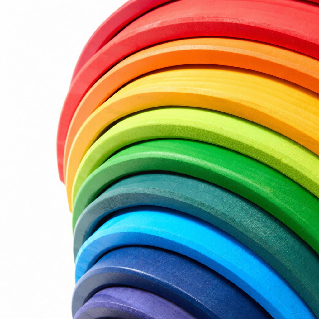 Close-up of the rainbow stacker's painted wooden arches