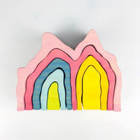 Pastel castle-shaped wooden stacking puzzle