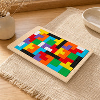 Wooden Tetris Puzzle - Colorful Brain Teaser Game set out on a real table at home