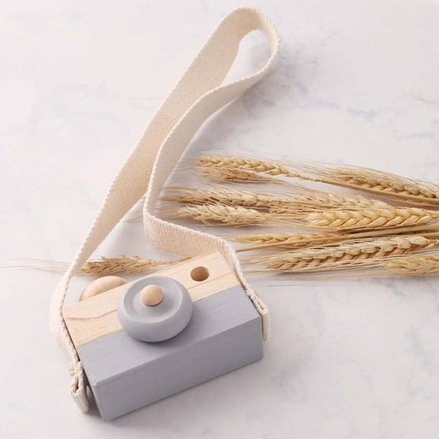 Wooden toy camera in grey with a cotton neck strap