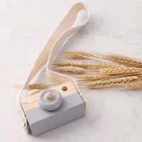 Wooden toy camera in grey with a cotton neck strap